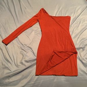 Brown one sleeve dress with a bottom slit